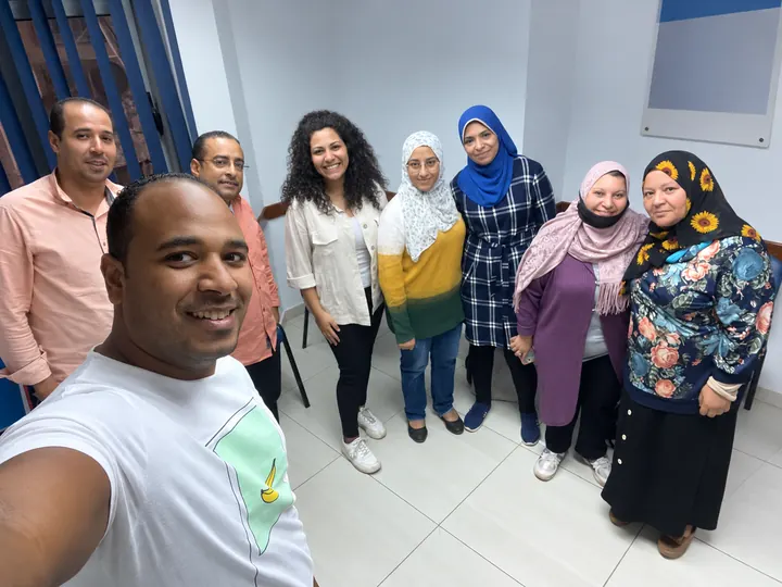 A classroom group photo with English learners